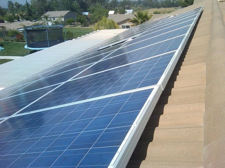 Clean rooftop solar panels after rinsing