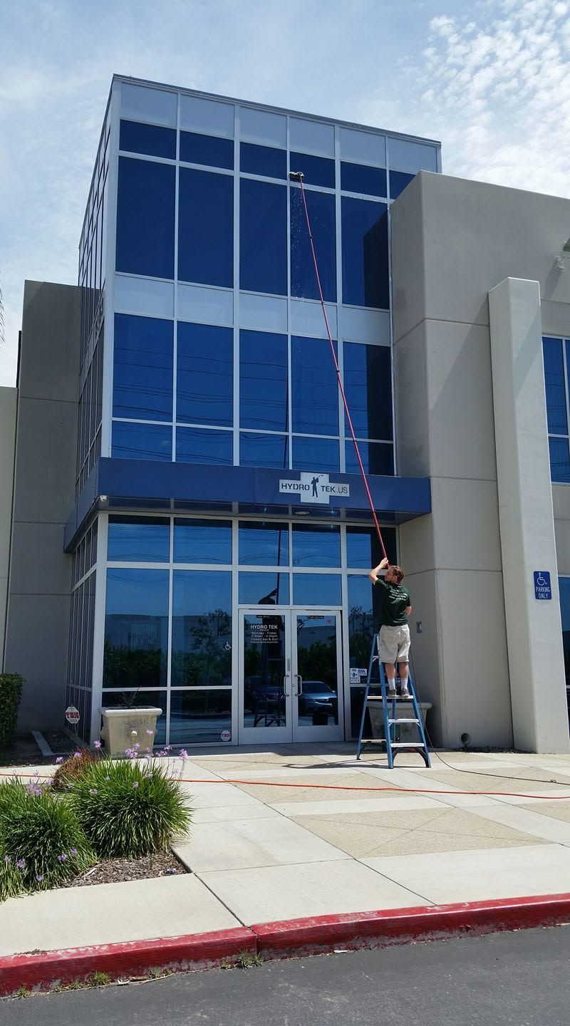 Multi-story commercial building with large exterior windows
